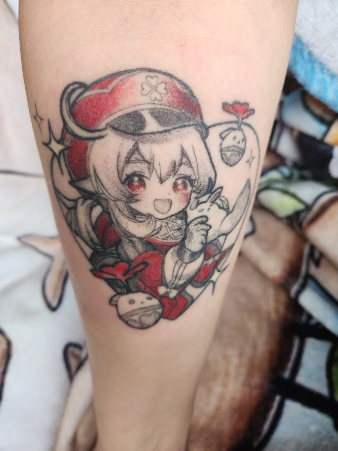 Anime style color tattoo on leg
