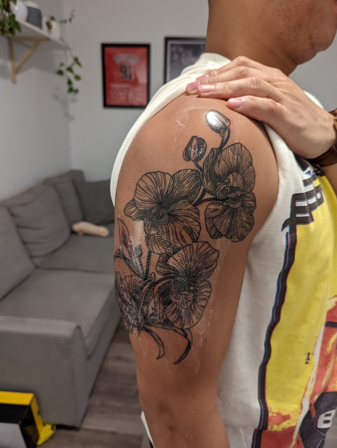 Fresh floral shoulder tattoo at Anbu Tattoo Studio Toronto
